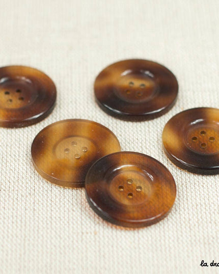 Tortoiseshell button with raised rim, 4 holes, 27 mm