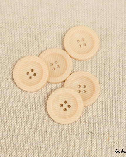 Flat edge sand grain button 4 holes 27 mm